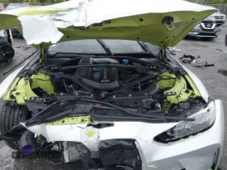 2022 BMW M4 Competition with VIN WBS33AZ04NCJ20184, listed as a IAAI auction lot 41205528 with 25,571 mi miles. Bid and sale history available at carsss.com. Image 10.