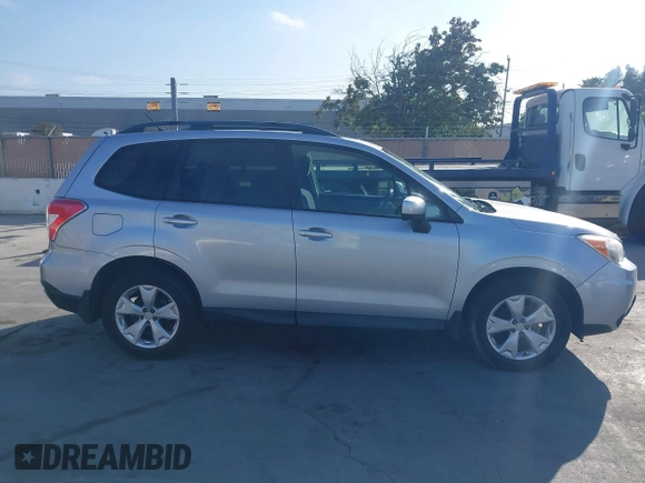 2014 Subaru Forester Premium with VIN JF2SJAEC5EH551632, listed as a IAAI auction lot 42640444 with 240,591 mi miles and . Bid and sale history available at DreamBid. Image 13.