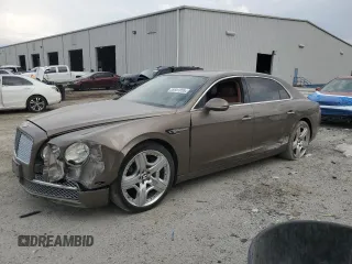 2014 Bentley Flying Spur с VIN SCBEC9ZA9EC091162, выставлен на аукционе Copart как лот 55941855 с пробегом 135 032 миль миль и Списание • Salvage title. История ставок и продаж доступна на DreamBid. Изображение 1.