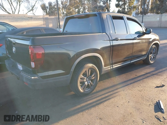 2017 Honda Ridgeline Sport with VIN 5FPYK2F19HB002939, listed as a IAAI auction lot 41728020 with 94,322 mi miles and . Bid and sale history available at DreamBid. Image 4.