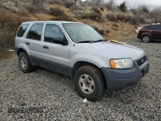 2004 Ford Escape XLS with VIN 1FMYU92194KA15099, listed as a Copart auction lot 47258535 with 147,409 mi miles and Clean Title. Bid and sale history available at DreamBid. Image 4.