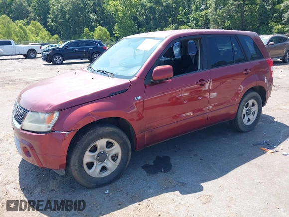 2008 Suzuki Grand Vitara with VIN JS3TE941784102150, listed as a IAAI auction lot 42648115 with 112,959 mi miles and . Bid and sale history available at DreamBid. Image 2.