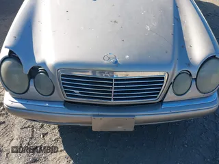 1996 Mercedes-Benz E-Class with VIN WDBJF55F2TJ005257, listed as a IAAI auction lot 40588819 with 999,999 mi miles. Bid and sale history available at carsss.com. Image 10.
