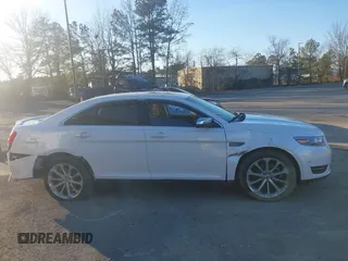 2018 Ford Taurus Limited with VIN 1FAHP2F89JG137749, listed as a IAAI auction lot 41356308 with 134,704 mi miles and . Bid and sale history available at DreamBid. Image 14.