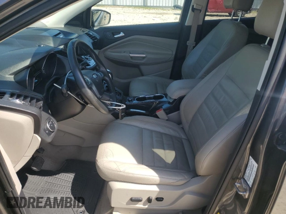 2015 Ford Escape Titanium with VIN 1FMCU9J92FUC74879, listed as a Copart auction lot 54683185 with 143,436 mi miles and Salvage title. Bid and sale history available at DreamBid. Image 7.