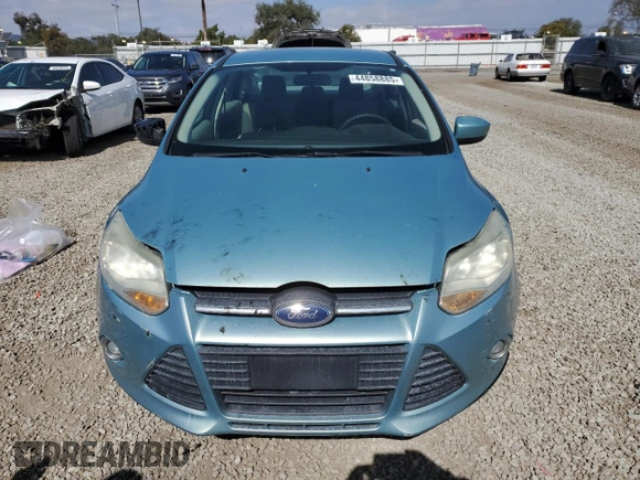 2012 Ford Focus SE z VIN 1FAHP3F29CL220030, wystawiony jako Copart lot #44858885 z przebiegiem 67 436 mil mil oraz Czysty tytuł • Clean title. Historia ofert i sprzedaży dostępna na DreamBid. Obrazek 5.