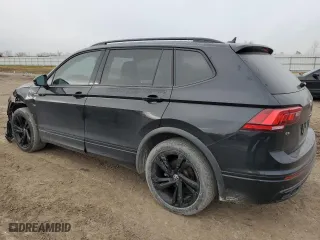 2023 Volkswagen Tiguan SE R-Line Black with VIN 3VVCB7AX8PM016614, listed as a Copart auction lot 43944695 with 39,378 mi miles and Salvage Title. Bid and sale history available at carsss.com. Image 2.