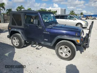 1998 Jeep Wrangler SE with VIN 1J4FY29P6WP705491, listed as a Copart auction lot 61873695 with 195,678 mi miles and Clean title. Bid and sale history available at DreamBid. Image 4.