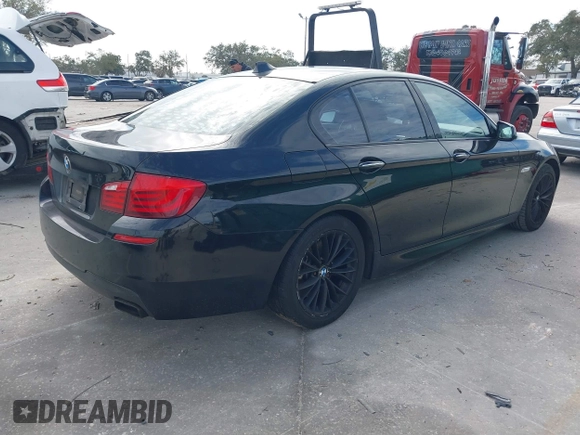 2013 BMW 5 Series 550i xDrive with VIN WBAFU9C56DDY70485, listed as a IAAI auction lot 41276612 with 116,452 mi miles and . Bid and sale history available at carsss.com. Image 4.