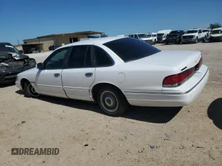 1995 Ford Crown Victoria z VIN 2FALP73W7SX158296, wystawiony jako Copart lot #56706735 z przebiegiem 104 884 mil mil oraz Czysty tytuł • Clean title. Historia ofert i sprzedaży dostępna na DreamBid. Obrazek 2.
