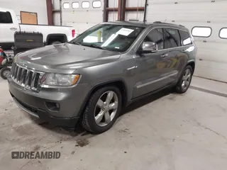 2013 Jeep Grand Cherokee Overland with VIN 1C4RJFCT9DC524605, listed as a IAAI auction lot 42016103 with 215,352 mi miles. Bid and sale history available at carsss.com. Image 17.