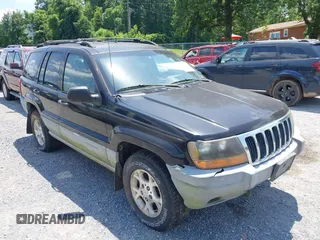 2000 Jeep Grand Cherokee Laredo with VIN 1J4GW48N7YC357376, listed as a IAAI auction lot 42503429 with 211,154 mi miles and . Bid and sale history available at DreamBid. Image 6.