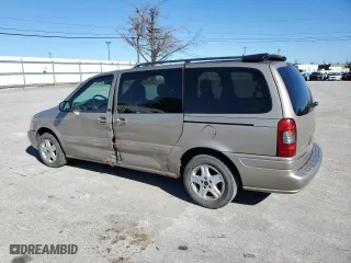 2004 Chevrolet Venture Warner Bros 1SE Pkg with VIN 1GNDX13E74D105294, listed as a Copart auction lot 74743294 with 111,928 mi miles and Salvage Title. Bid and sale history available at carsss.com. Image 2.
