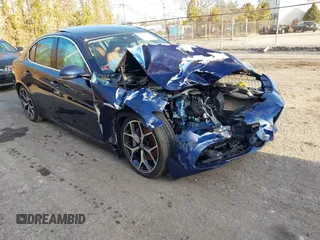 2021 Alfa Romeo Giulia Ti z VIN ZARFANBN4M7648988, wystawiony jako IAAI lot #41275050 z przebiegiem 52 950 mil mil oraz . Historia ofert i sprzedaży dostępna na DreamBid. Obrazek 1.