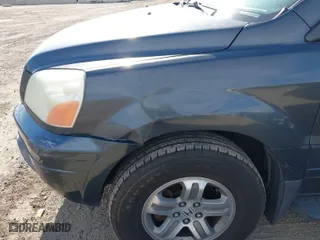 2003 Honda Pilot EX with VIN 2HKYF18483H577462, listed as a IAAI auction lot 42024638 with 246,158 mi miles. Bid and sale history available at carsss.com. Image 6.