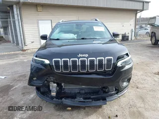 2021 Jeep Cherokee Latitude Lux with VIN 1C4PJMMX1MD216254, listed as a IAAI auction lot 41947214 with 35,445 mi miles and . Bid and sale history available at DreamBid. Image 6.