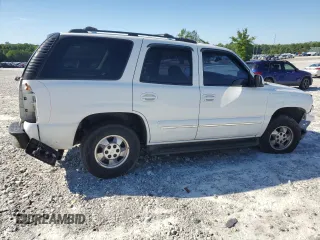 2003 Chevrolet Tahoe LS with VIN 1GNEC13Z03J213727, listed as a Copart auction lot 57206395 with 191,202 mi miles and Salvage title. Bid and sale history available at DreamBid. Image 3.