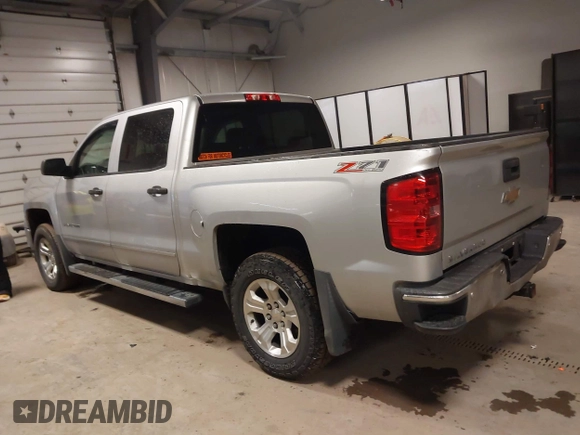 2014 Chevrolet Silverado 1500 LT with VIN 3GCUKREC4EG291351, listed as a IAAI auction lot 41732290 with 194,135 mi miles and . Bid and sale history available at DreamBid. Image 14.