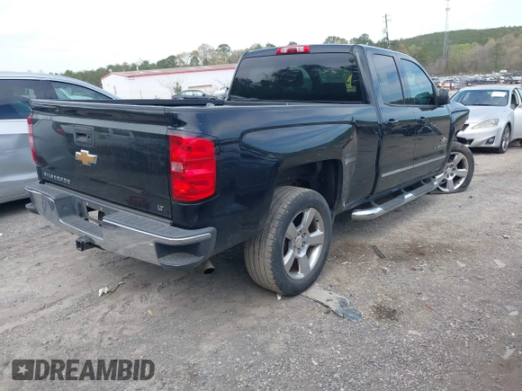 2014 Chevrolet Silverado 1500 LT with VIN 1GCRCREH3EZ138815, listed as a IAAI auction lot 41883354 with 214,630 mi miles. Bid and sale history available at carsss.com. Image 4.