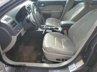 2012 Ford Fusion Hybrid z VIN 3FADP0L33CR211609, wystawiony jako Copart lot #60873005 z przebiegiem 144 474 mil mil oraz Szkoda całkowita • Salvage title. Historia ofert i sprzedaży dostępna na DreamBid. Obrazek 7.