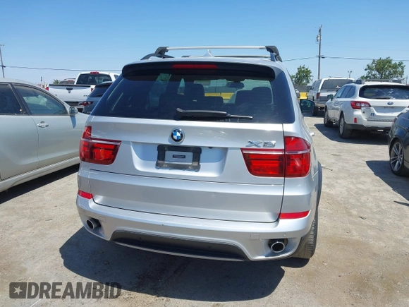 2012 BMW X5 35d with VIN 5UXZW0C58CL671141, listed as a IAAI auction lot 42644381 with 127,464 mi miles and . Bid and sale history available at DreamBid. Image 16.