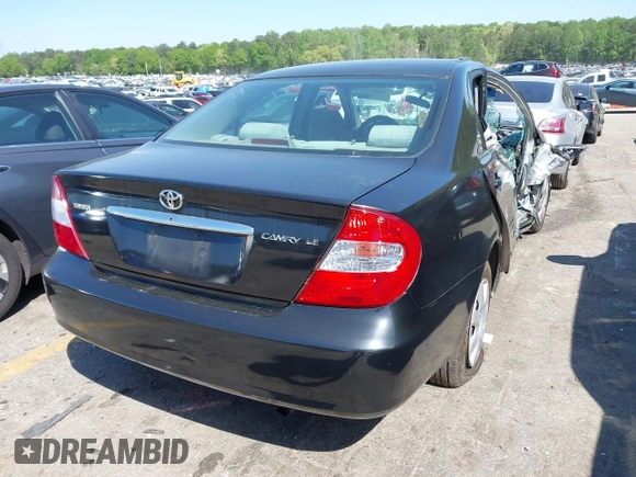 2004 Toyota Camry LE with VIN 4T1BE32K54U270040, listed as a IAAI auction lot 41984769 with Not provided miles and . Bid and sale history available at DreamBid. Image 4.