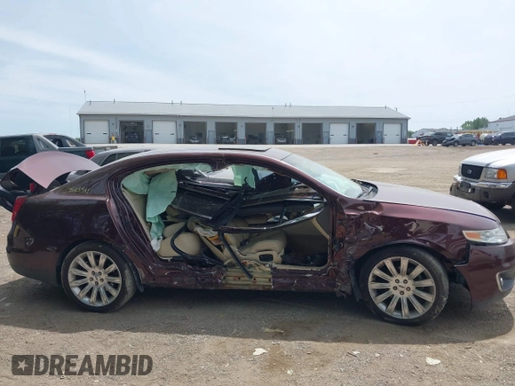 2012 Lincoln MKS with VIN 1LNHL9DRXCG802389, listed as a IAAI auction lot 39543911 with 97,957 mi miles. Bid and sale history available at carsss.com. Image 6.
