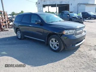 2013 Dodge Durango Crew with VIN 1C4RDJDG4DC693474, listed as a IAAI auction lot 42646643 with 176,208 mi miles and . Bid and sale history available at DreamBid. Image 1.