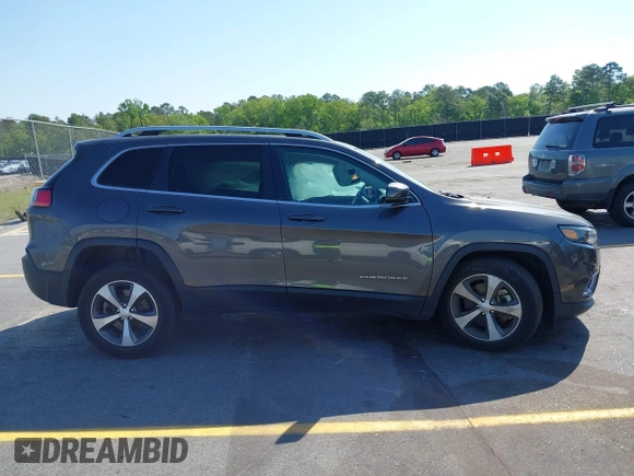2021 Jeep Cherokee Limited z VIN 1C4PJMDX6MD209395, wystawiony jako IAAI lot #42073746 z przebiegiem 26 627 mil mil oraz . Historia ofert i sprzedaży dostępna na DreamBid. Obrazek 13.