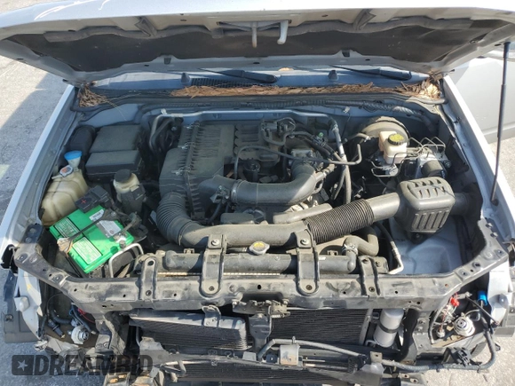 2011 Nissan Frontier S with VIN 1N6BD0CT1BC414440, listed as a Copart auction lot 52670115 with 179,879 mi miles and Salvage title. Bid and sale history available at DreamBid. Image 11.