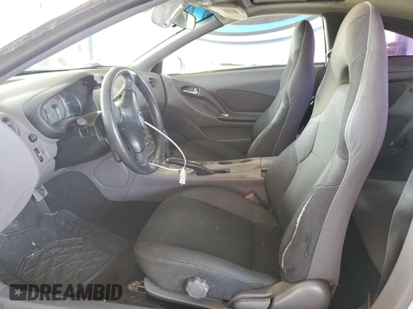 2001 Toyota Celica GT z VIN JTDDR32TX10093188, wystawiony jako Copart lot #56589435 z przebiegiem 134 624 mil mil oraz Szkoda całkowita • Salvage title. Historia ofert i sprzedaży dostępna na DreamBid. Obrazek 7.