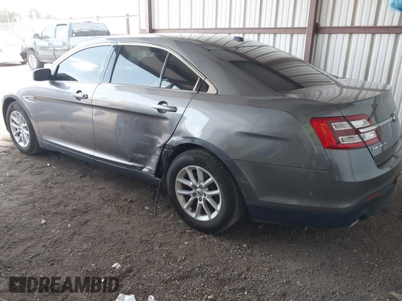 2014 Ford Taurus SE with VIN 1FAHP2D89EG136335, listed as a IAAI auction lot 41880655 with 211,635 mi miles. Bid and sale history available at carsss.com. Image 3.