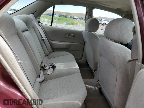 1997 Nissan Altima XE z VIN 1N4BU31DXVC181006, wystawiony jako Copart lot #57670815 z przebiegiem 98 202 mil mil oraz Szkoda całkowita • Salvage title. Historia ofert i sprzedaży dostępna na DreamBid. Obrazek 10.