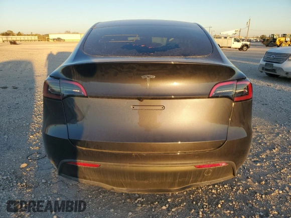 2024 Tesla Model Y с VIN 7SAYGDED4RA324326, выставлен на аукционе Copart как лот 86965534 с пробегом Не указан миль и Списание • Salvage title. История ставок и продаж доступна на DreamBid. Изображение 6.