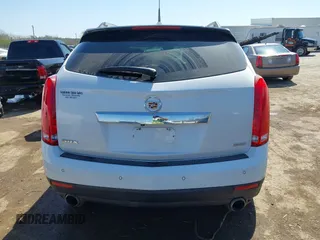 2014 Cadillac SRX Performance Collection with VIN 3GYFNCE38ES675508, listed as a IAAI auction lot 41969292 with 147,534 mi miles and . Bid and sale history available at DreamBid. Image 16.