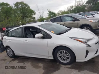 2017 Toyota Prius Two with VIN JTDKBRFUXH3036063, listed as a IAAI auction lot 42036676 with 202,873 mi miles. Bid and sale history available at carsss.com. Image 13.