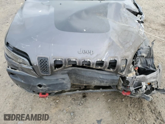 2021 Jeep Cherokee Trailhawk with VIN 1C4PJMBX7MD215581, listed as a Copart auction lot 51281205 with 62,199 mi miles and Salvage title. Bid and sale history available at DreamBid. Image 14.