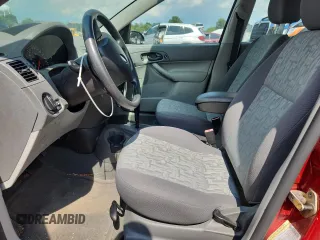 2005 Ford Focus S с VIN 1FAFP34N85W187592, выставлен на аукционе Copart как лот 64759925 с пробегом 27 051 миль миль и Чистый • Clean title. История ставок и продаж доступна на DreamBid. Изображение 7.