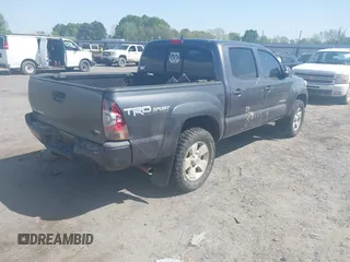 2015 Toyota Tacoma with VIN 5TFLU4EN6FX112735, listed as a IAAI auction lot 41997990 with 159,322 mi miles and . Bid and sale history available at DreamBid. Image 4.