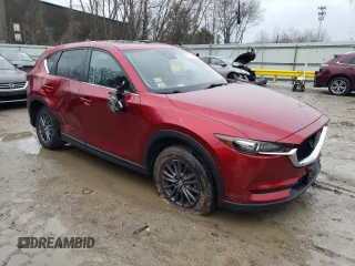 2019 Mazda CX-5 Touring with VIN JM3KFBCMXK0632631, listed as a Copart auction lot 45414485 with 80,795 mi miles and Salvage Title. Bid and sale history available at DreamBid. Image 4.