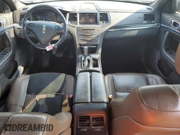 2013 Lincoln MKS с VIN 1LNHL9DK6DG602906, выставлен на аукционе Copart как лот 60415525 с пробегом 158 151 миль миль и Списание • Salvage title. История ставок и продаж доступна на DreamBid. Изображение 8.