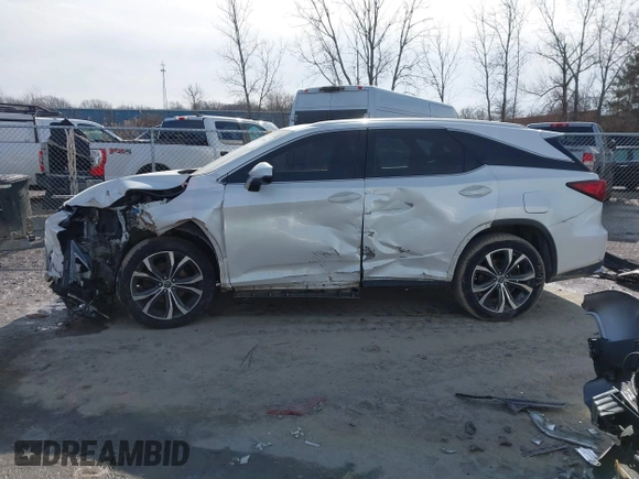 2018 Lexus RX 350L Premium z VIN JTJDZKCAXJ2005488, wystawiony jako IAAI lot #41509043 z przebiegiem 151 814 mil mil oraz . Historia ofert i sprzedaży dostępna na DreamBid. Obrazek 14.