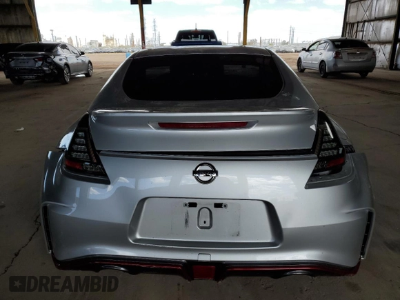 2015 Nissan 370Z Nismo z VIN JN1AZ4EH1FM441060, wystawiony jako Copart lot #53423725 z przebiegiem Nie podano mil oraz Szkoda całkowita • Salvage title. Historia ofert i sprzedaży dostępna na DreamBid. Obrazek 6.