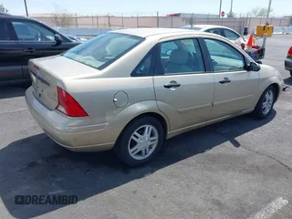 2002 Ford Focus SE with VIN 1FAFP343X2W287803, listed as a IAAI auction lot 41980504 with 63,748 mi miles and . Bid and sale history available at carsss.com. Image 4.