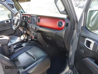 2020 Jeep Wrangler Unlimited Rubicon with VIN 1C4HJXFN4LW136516, listed as a IAAI auction lot 41874403 with 87,576 mi miles. Bid and sale history available at carsss.com. Image 5.