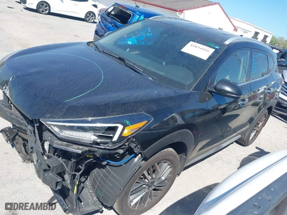 2021 Hyundai Tucson Limited with VIN KM8J33AL9MU305948, listed as a IAAI auction lot 41834956 with 100,098 mi miles. Bid and sale history available at carsss.com. Image 2.