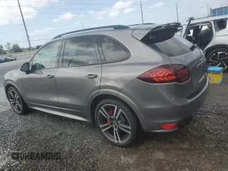 2014 Porsche Cayenne GTS с VIN WP1AD2A22ELA70950, выставлен на аукционе Copart как лот 48324015 с пробегом 75 310 миль миль и На запчасти • Non repairable. История ставок и продаж доступна на DreamBid. Изображение 2.
