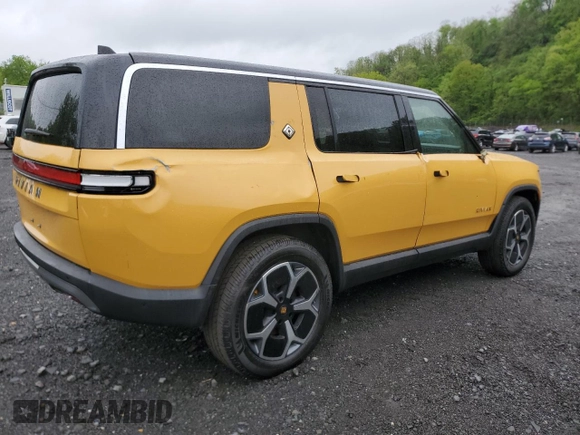 2023 Rivian R1S Adventure z VIN 7PDSGABA1PN009442, wystawiony jako Copart lot #55835815 z przebiegiem 28 048 mil mil oraz Szkody całkowita. Historia ofert i sprzedaży dostępna na DreamBid. Obrazek 3.