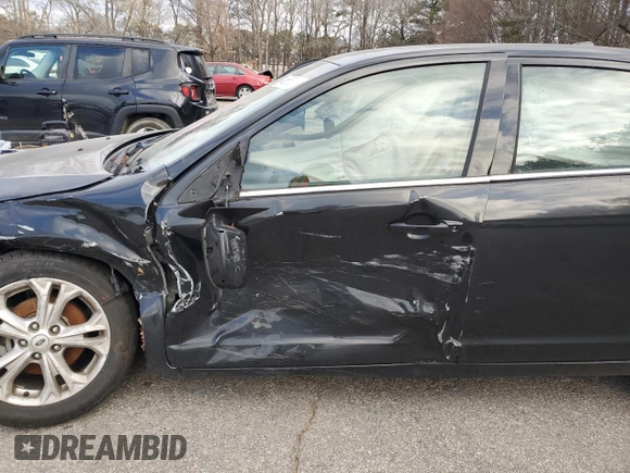 2012 Ford Fusion SE with VIN 3FAHP0HA7CR275113, listed as a Copart auction lot 46867635 with 195,236 mi miles and Salvage Title. Bid and sale history available at carsss.com. Image 7.