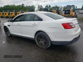 2015 Ford Police Interceptor with VIN 1FAHP2L82FG163718, listed as a Copart auction lot 56392295 with 122,940 mi miles and Salvage title. Bid and sale history available at DreamBid. Image 2.